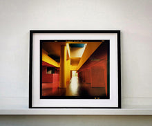 Load image into Gallery viewer, Italian designed brutalist architecture in Milan, featuring red and yellow pillars. 
