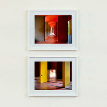 Load image into Gallery viewer, Monte Amiata housing, Gallaratese Quarter, Milan. Yellow brutalist architecture photograph by Richard Heeps framed in white paired with Utopian Foyer.