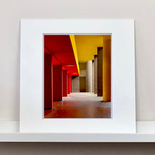 Load image into Gallery viewer, Monte Amiata housing, Gallaratese Quarter, Milan. Red and yellow mounted brutalist architecture street photography by Richard Heeps.