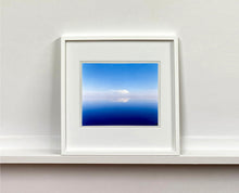 Load image into Gallery viewer, &#39;View from Bombay Beach&#39; looks over Salton Sea in California. Cooling shades of blue, reflection and symmetry are key to this serene waterscape. The suspended cloud which looks surreal creates a feeling of weightlessness. 