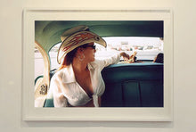 Load image into Gallery viewer, Wendy and Dolls, from Richard Heeps &#39;Man&#39;s Ruin&#39; Series, this is part of a sequence of artworks capturing Wendy at the Rockabilly Weekender, Viva Las Vegas. This cinematic portrait of Wendy captures her in the back seat of her classic American Oldsmobile.